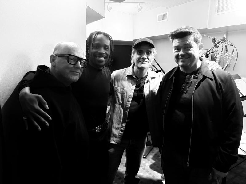 Justin K. Thompson, Shameik Moore, Oscar Isaac, and Chris Miller.