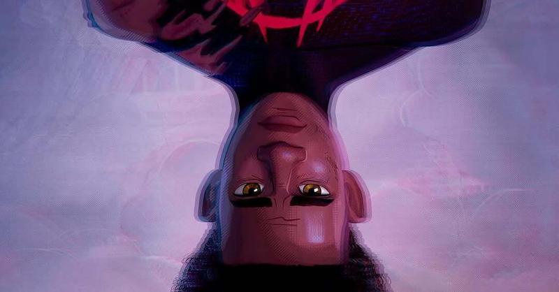 Miles Morales' Spider-Man hanging upside down in 'Spider-Man: Beyond the Spider-Verse.'