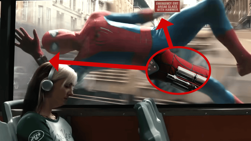 Image of Spider-Man from the original trailer against the bus window without his web-shooters.