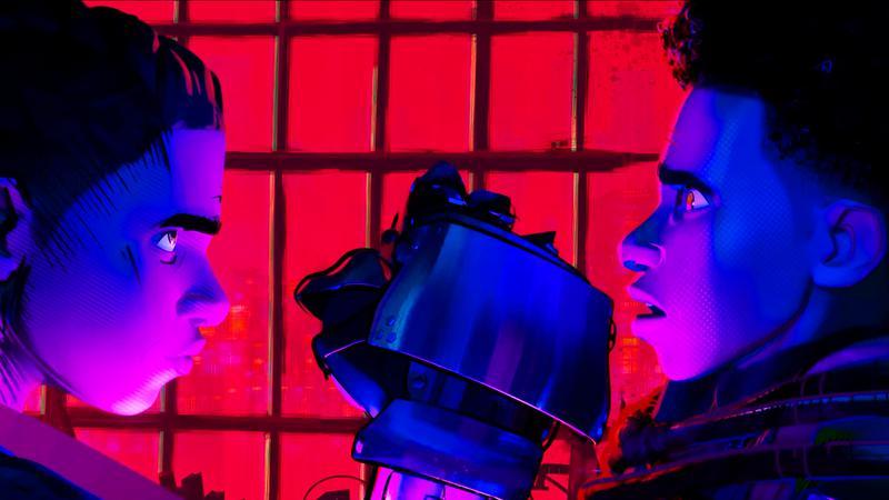 Prowler looking at Miles Morales in 'Spider-Man: Across the Spider-Verse.'