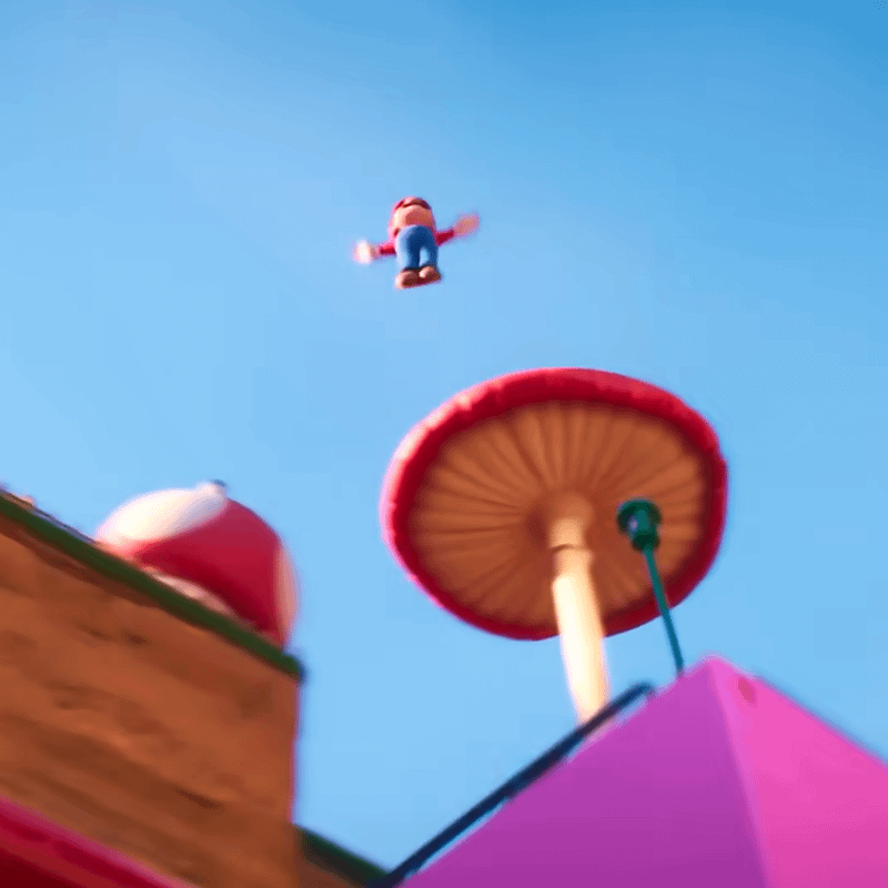 Mario doing a spin in the air in The Super Mario Bros. Movie.