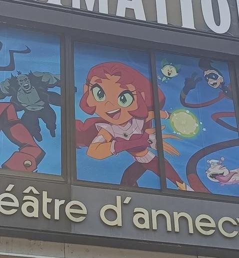 Starfire appears on promotional banner displayed at the 2026 Annecy International Animation Film Festival.