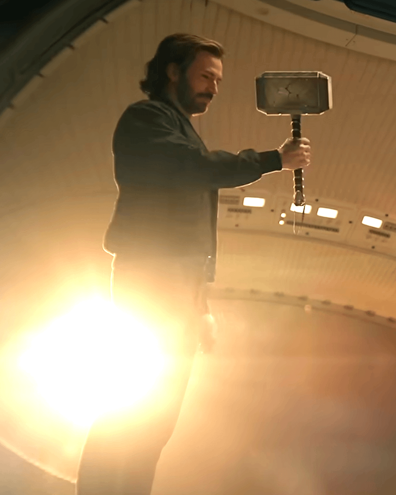 Chris Evans as Steve Rogers holding Mjolnir in Avengers: Doomsday.