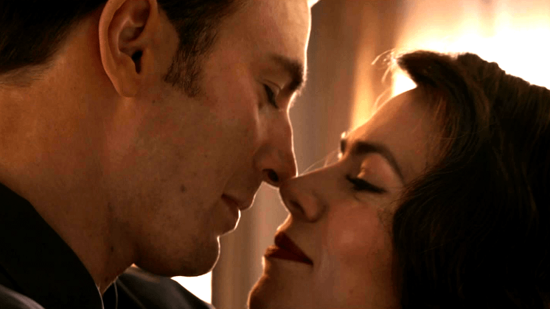 Steve Rogers and Peggy Carter lean close to each other for a long-awaited kiss at the end of Avengers: Endgame.