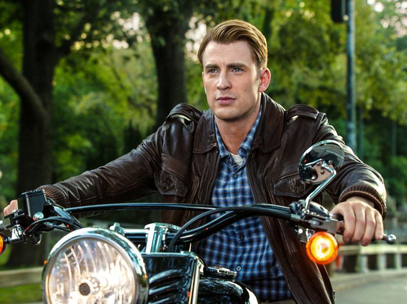 Steve Rogers riding on a motorcycle in The Avengers.