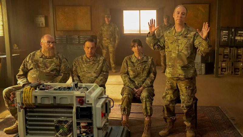 Bert (Brian Posehn), Barry Kripke (John Bowie), Denise (Lauren Lapkus), and Stuart (Kevin Sussman) as soldiers in Stuart Fails to Save the Universe.