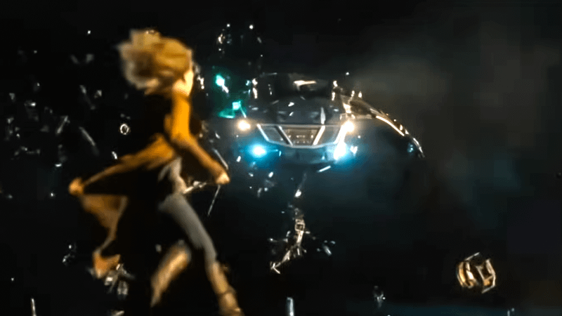 Kara dodging blue blasts.