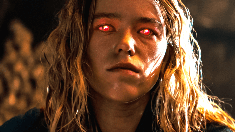 Milly Alcock Supergirl looking angry with red eyes.