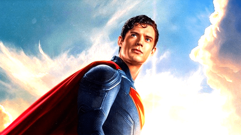 David Corenswet as Superman looking off into the distance in Superman
