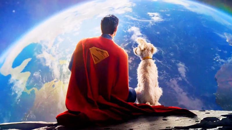 rear image of David Corenswet as Superman and Krypto the Super-Dog looking at Earth in 'Superman.'