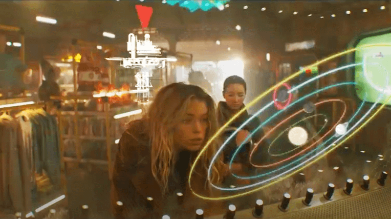 Supergirl and Ruthye looking at Solar System in Supergirl movie.
