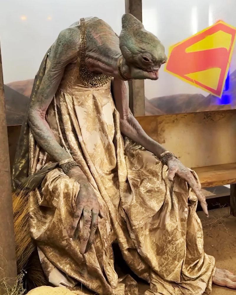 Supergirl 2026, alien animatronic from side.