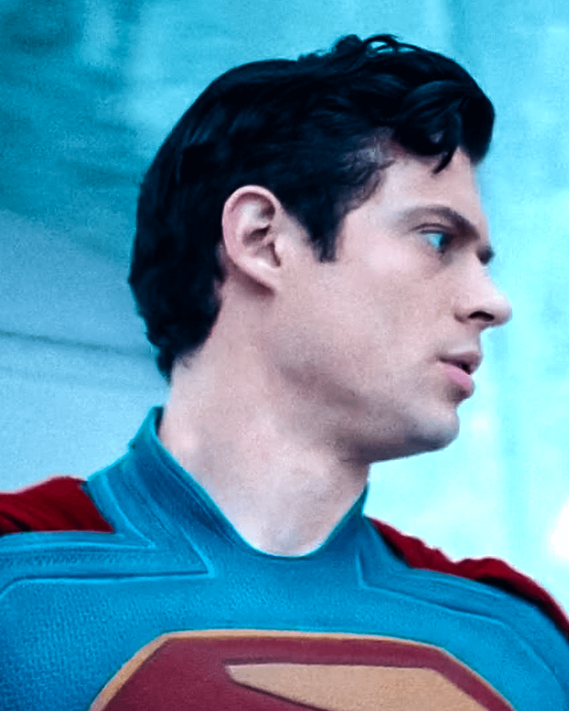 David Corenswet as Superman turning his head in 'Superman.'