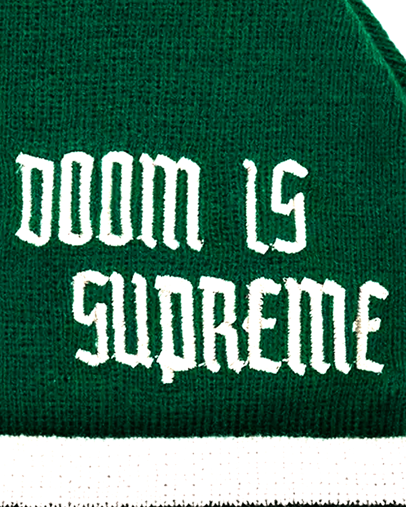 The Doom is Supreme slogan on the back of a beanie.