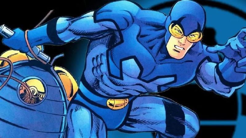Ted Kord Blue Beetle using a gadget in DC Comics.
