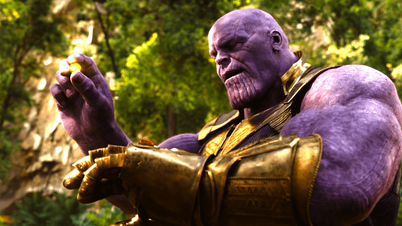 Thanos holding the Mind Stone in 