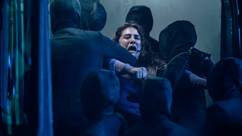 Becka being dragged away by the Eyes in The Testaments Episode 9.