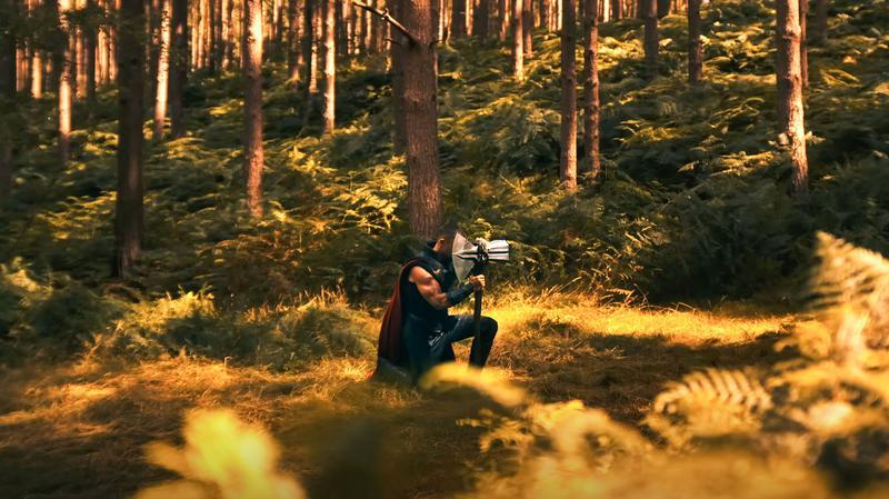 Chris Hemsworth's Thor kneeling while praying to Odin in Avengers: Doomsday.