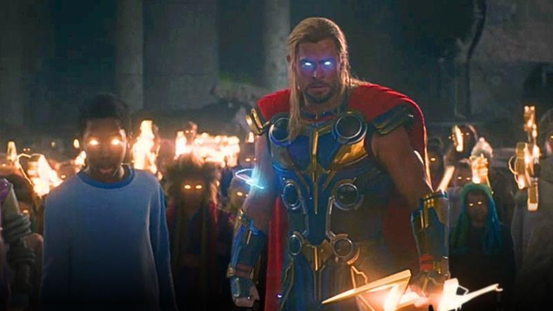 Thor using lightning with Asgardian children in Thor: Love and Thunder.