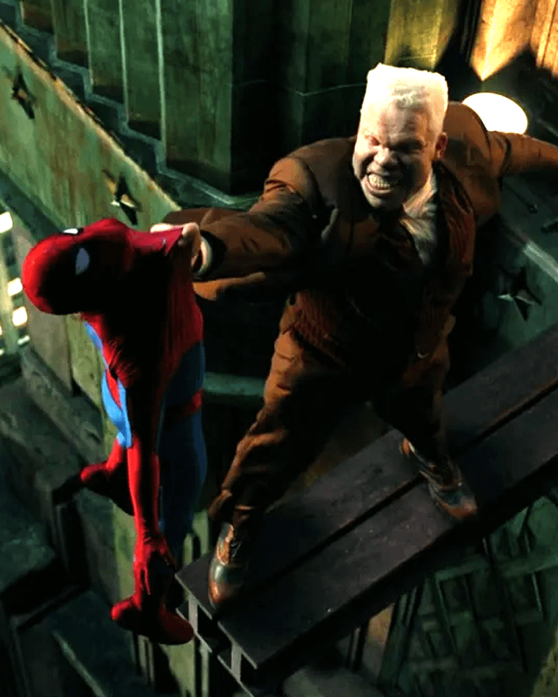 Tombstone holds a defeated Spidey.