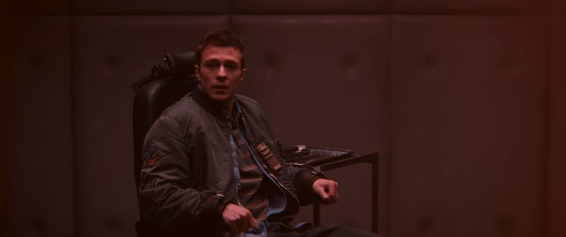 Ruaridh Mollica's Tommy Maximoff strapped to a chair in VisionQuest.
