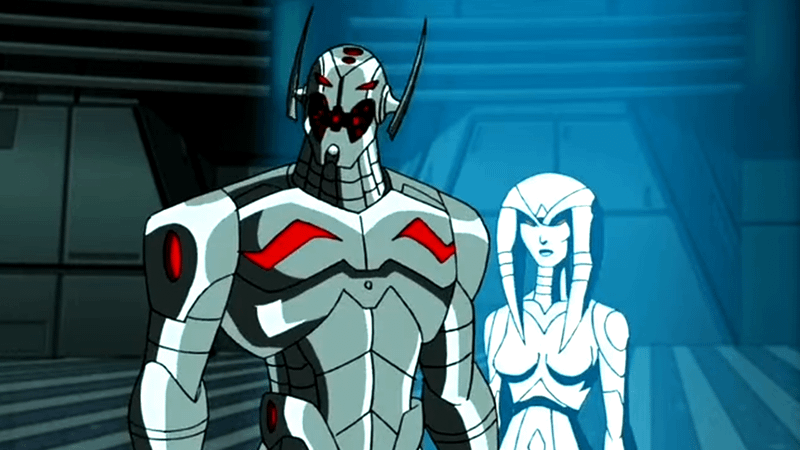 Ultron and Jacosta standing together in a metal building.