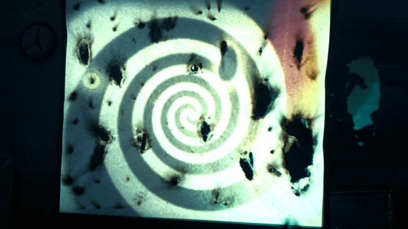 A spiral on a projector in Fallout Season 2