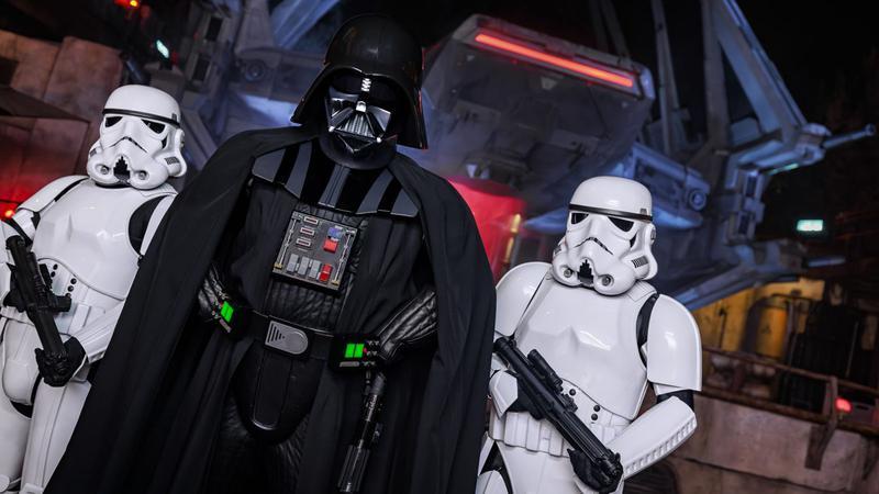 Darth Vader and two stormtroopers in Galaxy's Edge.