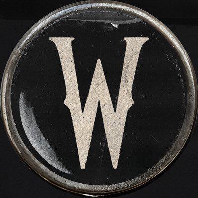 dark circle with white W inspired by keyboard letter