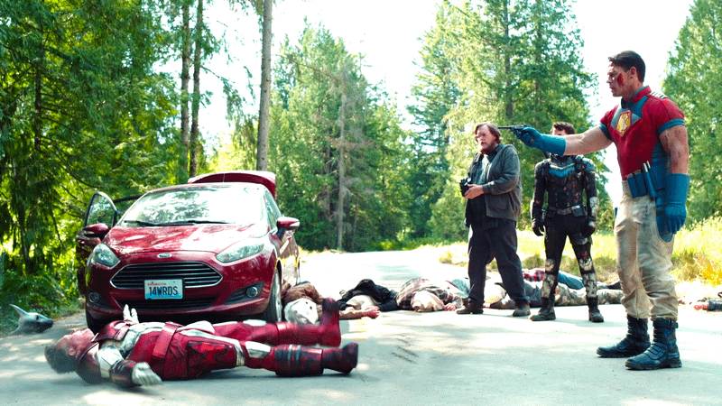 John Cena as Christopher Smith, Robert Patrick as Auggie Smith, Steve Agee as John Economos, & Freddie Stroma as Vigilante in Peacemaker Season 1