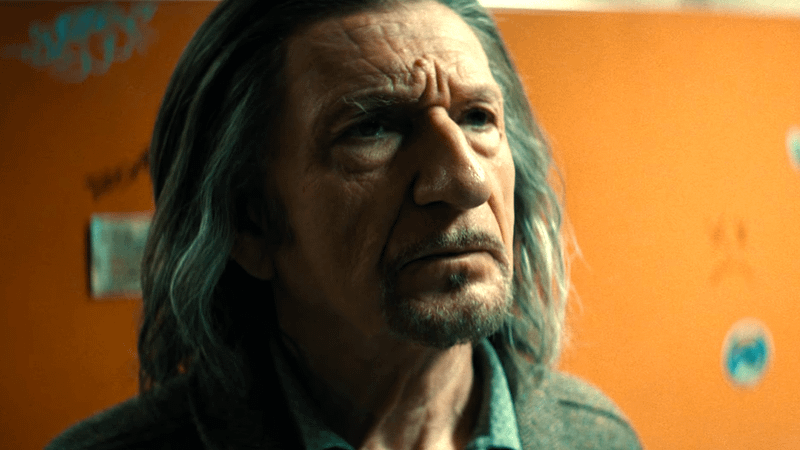 Ben Kingsley as Trevor Slattery looking up at something in Wonder Man