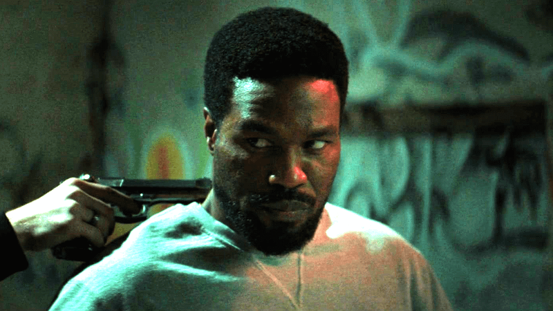 Yahya Abdul-Mateen II as Simon Williams with a gun at his neck in 'Wonder Man.'