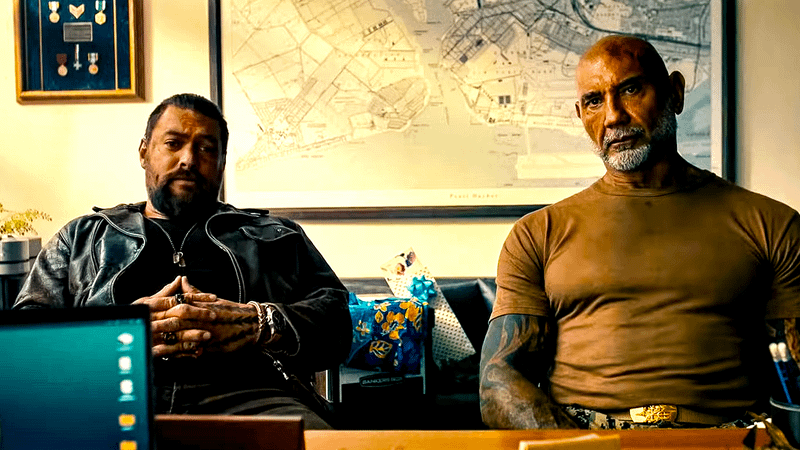 Jason Momoa as Jonny Hale & Dave Bautista as James Hale looking worried in The Wrecking Crew.