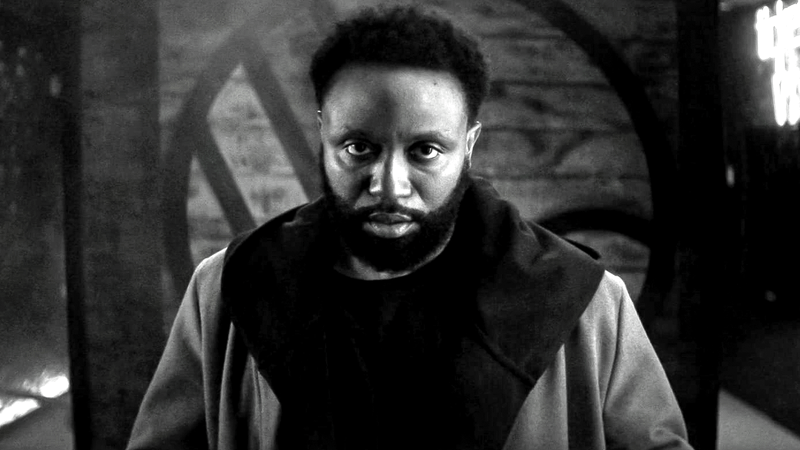 Bryon Bowers as Doorman in black and white in Wonder Man.