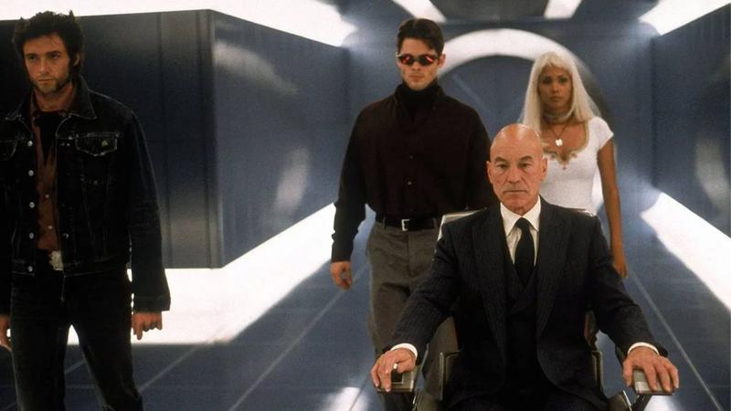 Wolverine standing away from the X-Men in the 2000 movie.