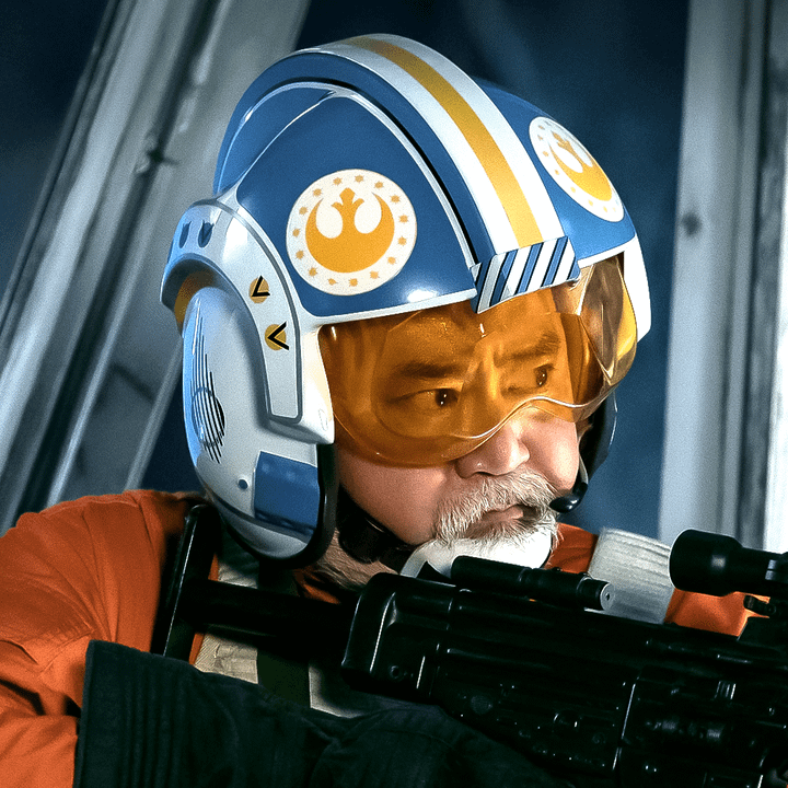 Carson Teva with a pilot helmet on in The Mandalorian.